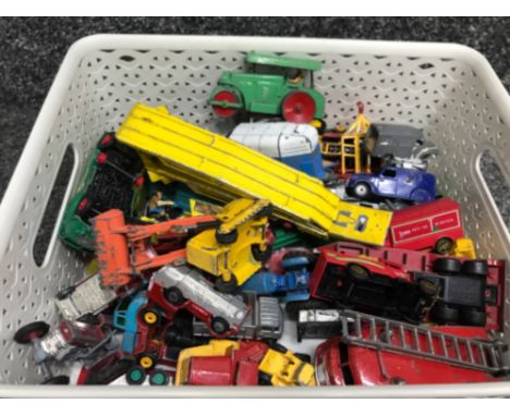 A box of vintage die cast vehicles to include corgi lesney matchbox mecanno etc