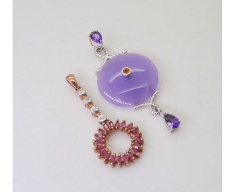 A 9ct rose gold ruby and diamond pendant, length 4cm, together with a lilac coloured hardstone and amethyst pendant, weight t