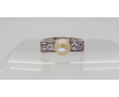 A white metal Art Deco pearl &amp; old cut diamond ring, size L, weight 3.2gms Condition Report:Available upon request