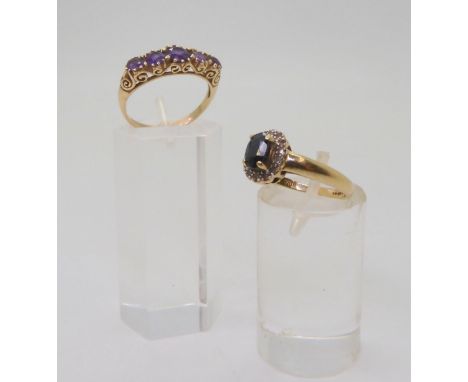 A yellow metal amethyst five stone ring, in scroll mount, size L, together with a 9ct gold sapphire and diamond accent ring, 