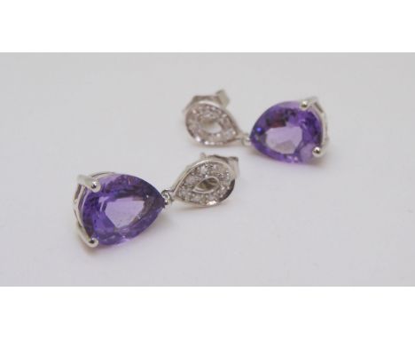 A pair of 9ct white gold amethyst and diamond earrings, weight 2.9gms To be sold on behalf of Chest Heart &amp; Stroke Scotla