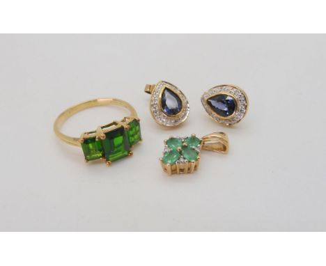 A 9ct gold QVC ring set with three Russian diopsides, finger size R1/2, together with a 9ct gold emerald and diamond accent f