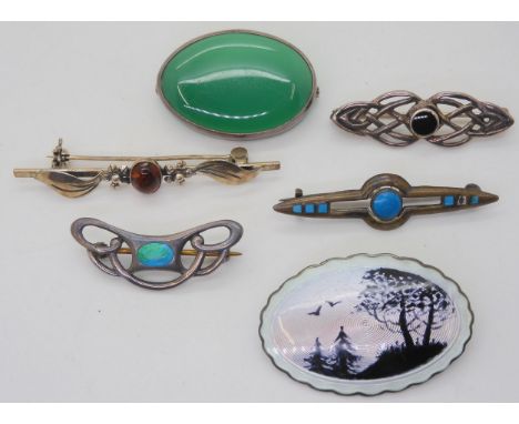 Two Charles Horner enamelled Art Nouveau brooches, both Chester dated 1910 -1912, a Norwegian silver and enamel brooch by Hjo
