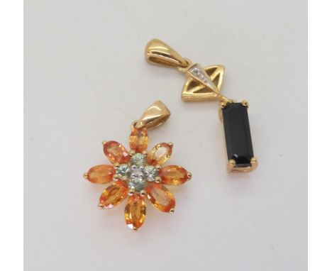 A 9ct gold bi colour orange gem (possibly Andalusite) green gem and diamond accent flower pendant, together with a 9ct gold t