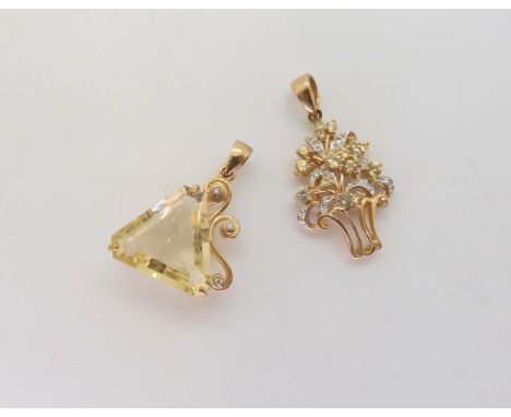 A 9ct gold diamond and mixed yellow gemstone flower pendant, length 3.3cm with bail, together with a triangular cut citrine a