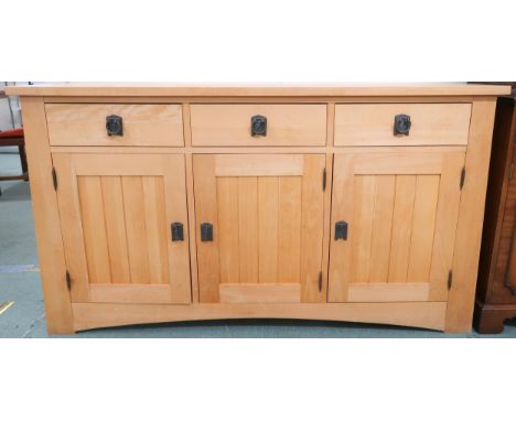 A contemporary sideboard with three drawers over three panel cabinet doors, 86cm high x 153cm wide x 42cm deep Condition Repo