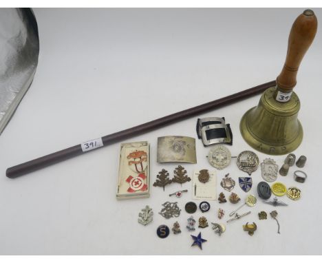 A WW2 ARP Warden's brass handbell, a leather-clad swagger stick, 1954 British Red Cross Nursing medal engraved to 5090 J. Law