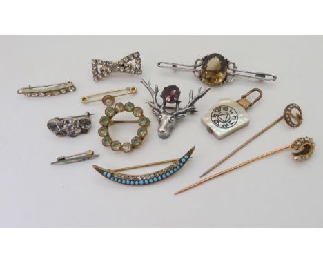 A yellow metal pearl set horseshoe pin, weight 2.1gms, together with other items of silver and costume to include a smokey qu