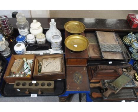 A Maw and Son pill roller and pottery inhaler, Chemists bottles, other pill rollers, a set of scales, a Morstadt Cachets box 