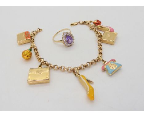 A 14k gold Italian cold enamel charm bracelet, weight 12.5gms,&nbsp;together with an amethyst and clear gem set ring, size M,