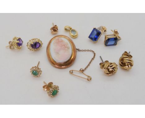 A pink and white conch shell cameo in a 9ct gold mount, together with five pairs of earrings, to include amethyst, emeralds a