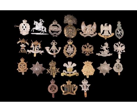 A collection of British army cavalry and yeomanry badges etc
