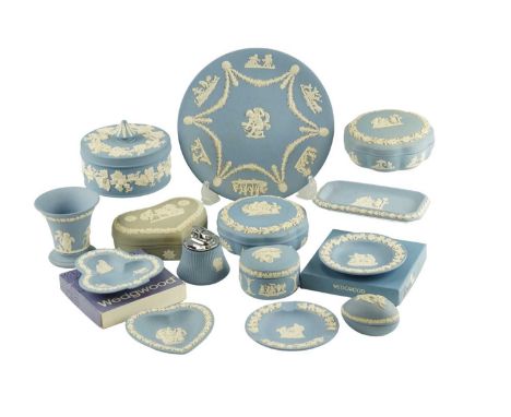 A quantity of Wedgwood blue Jasperware, including five lidded boxes, a table lighter, etc, together with a green Jasperware l