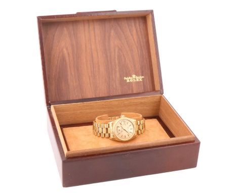 A Rolex 18 ct gold Oyster Perpetual Day-Date wristwatch, having a calibre 3055 Superlative Chronometer movement, the bezel an