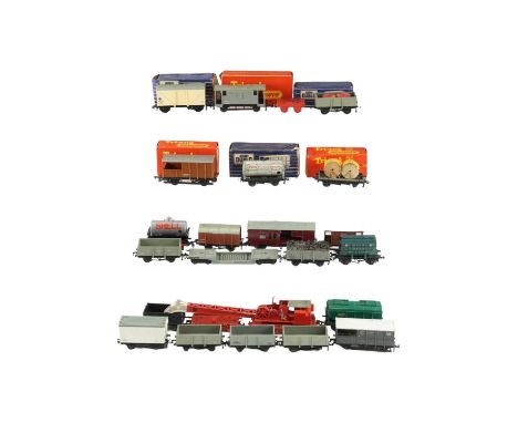 A group of Hornby Dublo and Triang OO gauge rolling stock, Esso and Shell tank cars, etc