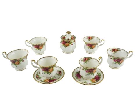 A small quantity of Royal Albert Old Country Roses tableware, comprising coffee and teacups, side plates and a sugar basin