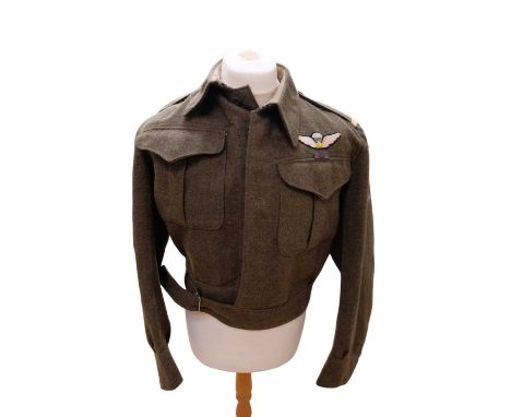 A 1943 Canadian Battledress Blouse bearing later insignia