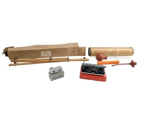 A vintage Heavy-Duty Hydrometer by A Endemano &amp; Co Ltd together with a Reeves' No 3a Pantograph, a Photopia Hotshoe light
