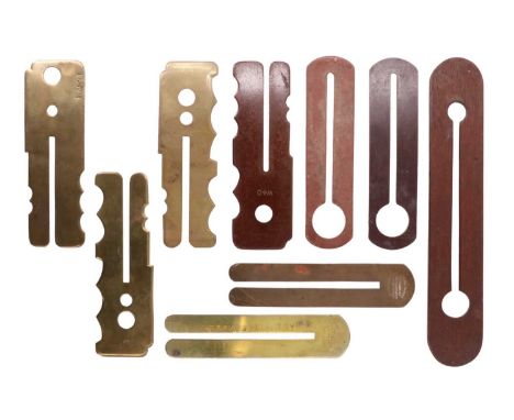 A collection of button sticks / clothing protectors, two bearing service numbers, one of which with related research