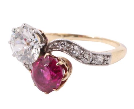 A diamond and ruby crossover ring, comprising a brilliant diamond and a brilliant ruby, each of approximately one carat, crow