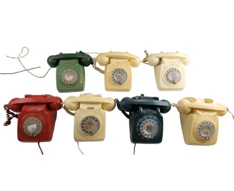 Seven 700 series rotary dial telephones, marked '746 F' and '746 GEN'