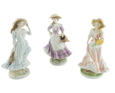 Three Royal Worcester figurines, comprising Spring, Summer, and Autumn, tallest 24 cm