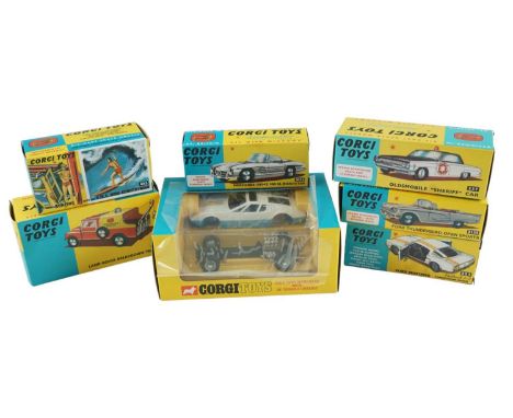 A group of boxed Corgi Model Club diecast toy cars, comprising a Ghia 5000 Mangusta with De Tomaso Chassis (271), a Land-Rove