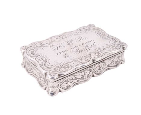 A Victorian silver snuff box by Nathaniel Mills, having concave sides with serpentine edges, the hinged lid having an engrave