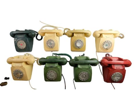 Eight 700 series rotary dial telephones, model 746F