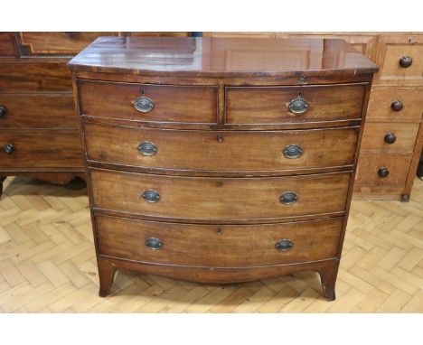 A George III bow-fronted mahogany chest of two short over three long drawers, 105 x 55 x 105 cm