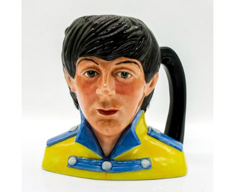 Yellow tunic; blue collar and epaulettes.Series: The Beatles. Royal Doulton backstamp. Artist: Stanley J. TaylorIssued: 1984 