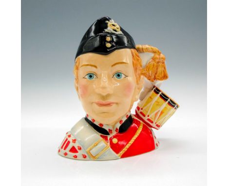 Red, white, black, light brown, and grey coloration.The North Staffordshire Drummer Boy character jug was one of the complime