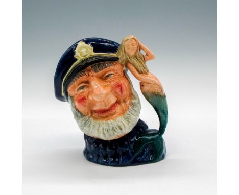 Variation One. Dark blue fisherman's jersey; mermaid has a green tail.When the miniature Old Salt jug was launched in 1984, i