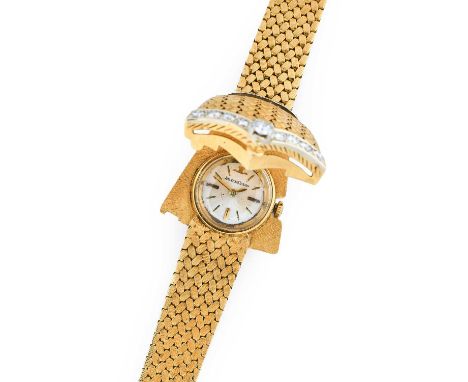 Jaeger LeCoultre: An Unusual Lady's 18 Carat Gold Diamond Set Concealed Dial Wristwatch, signed Jaeger LeCoultre, circa 1965,
