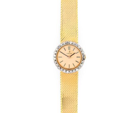 Omega: A Lady's 18 Carat Gold Diamond Set Wristwatch, signed Omega, 1965, (calibre 620) manual wound lever movement signed an