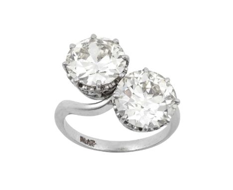 A Diamond Two Stone Twist Ringthe old cut diamonds in white claw settings, to a twist shoulder plain polished shank, total es