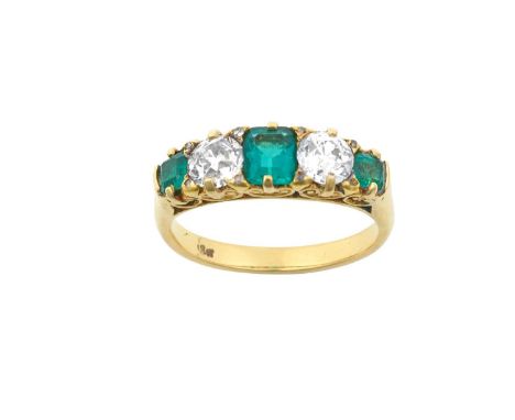 An Emerald and Diamond Five Stone Ringthree emerald-cut emeralds alternate with old cut diamonds, with rose cut diamond accen