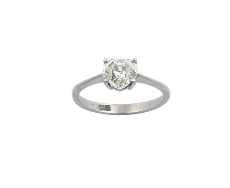 A Diamond Solitaire Ringthe fancy shield cut diamond in a white claw setting, to a tapered shoulder plain polished shank, est