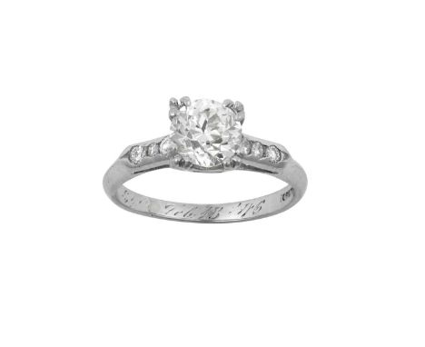 A Diamond Solitaire Ringthe old cut diamond in a white double claw setting, to old cut and round brilliant cut diamond set sh