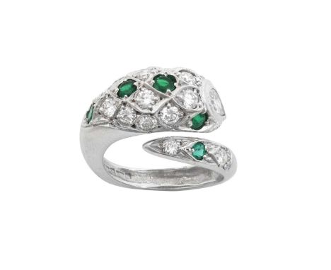 An 18 Carat White Gold Emerald and Diamond Ringthe snake motif set throughout with round brilliant cut diamonds, a pear cut d