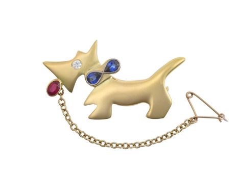 An 18 Carat Gold Ruby, Sapphire and Diamond Novelty Broochmodelled as a stylised Scottish Terrier, comprising of a yellow pla