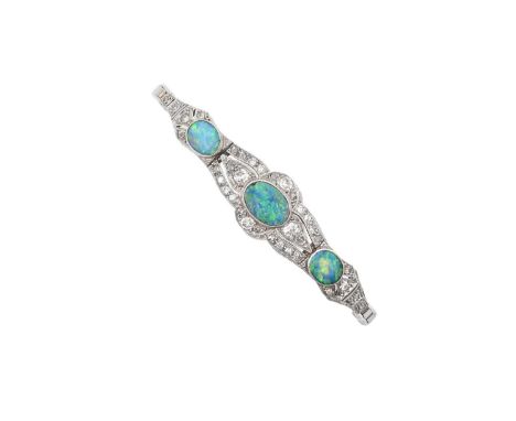 An Early 20th Century Opal and Diamond Braceletthree graduated oval opal plaques within tapered openwork borders of old cut, 