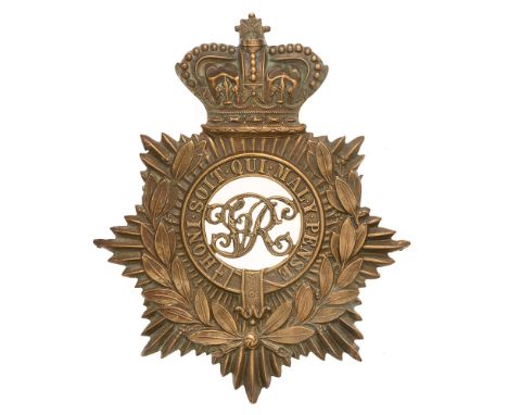 Military Police Victorian helmet plate badge c. 1878-1901.  Good scarce die-stamped brass crowned star bearing laurel sprays 