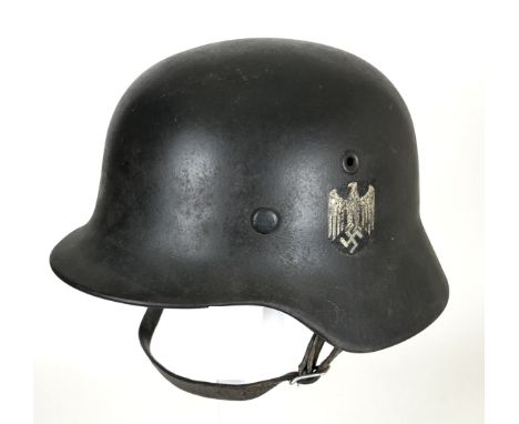 WW2 German Third Reich Army Single Decal Steel Combat Helmet. A good rolled edge example retaining Army eagle decal to left s