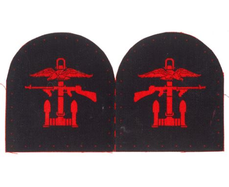 Combined Operations WW2 facing pair of printed formation sign badges. c 1942. Good red red anchor, Tommy Gun and eagle printe