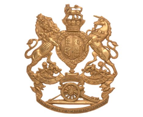 British Columbia Garrison Artillery Victorian Canadian helmet plate badge.  Good rare die-stamped brass Royal Arms, a scroll 