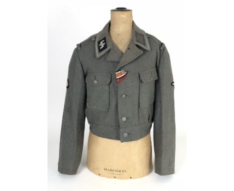 German Third Reich Waffen-SS M44 Field blouse.  Good rare grey woollen two pocket example, the front lined with grey herringb