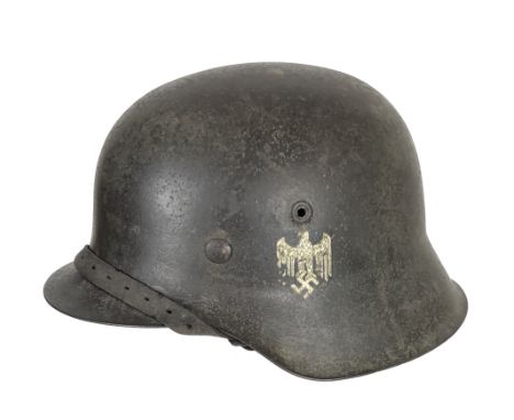 German Third Reich Army Single Decal Steel Helmet.   A scarce raw edge combat example with Army eagle to the left side (70% p