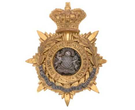 Manchester Regiment Victorian Officer's helmet plate badge c.1881-1901.  Fine gilt crowned star mounted with Garter resting i