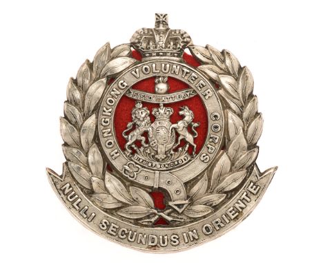 Hong Kong Volunteer Corps Victorian Field Battery Artillery helmet badge c. 1893-1902.  Good rare die-stamped British made wh